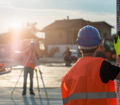 Surveyors on construction site